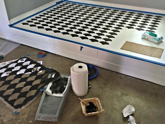 Stenciling a DIY garage floor using the Fishscale Allover Stencil from Cutting Edge Stencils. http://www.cuttingedgestencils.com/pattern-stencil-1.html
