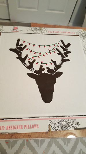 Stenciling a DIY Holiday inspired accent pillow using the Reindeer Paint-A-Pillow kit. http://www.cuttingedgestencils.com/reindeer-diy-accent-pillows-holiday-home-decor.html