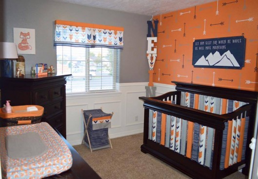 A DIY stenciled nursery accent wall using the Tribal Arrows Allover Stencil from Cutting Edge Stencils. http://www.cuttingedgestencils.com/tribal-arrow-pattern-stencils-wall-decor.html