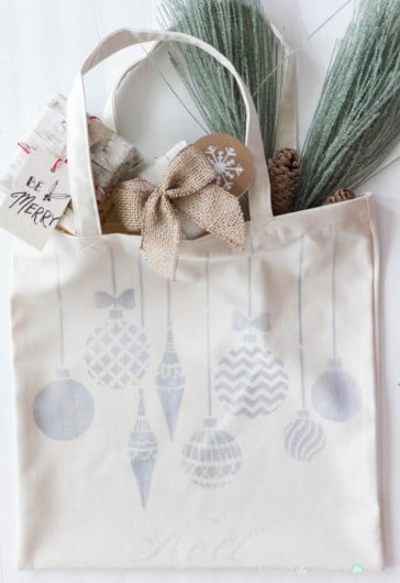 A DIY stenciled tote bag using the Christmas Ornaments Allover Stencil from Cutting Edge Stencils. http://www.cuttingedgestencils.com/christmas-ornamnets-accent-pillow-stencil-kit.html