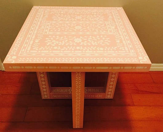 A DIY stenciled table in pink and white using the Indian Inlay Stencil Kit from Cutting Edge Stencils. http://www.cuttingedgestencils.com/indian-inlay-stencil-furniture.html