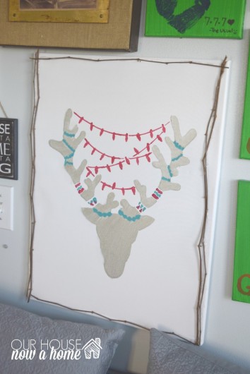 A DIY stenciled canvas art using the Reindeer Craft Stencil from Cutting Edge Stencils. http://www.cuttingedgestencils.com/reindeer-holiday-stencil-designs-for-diy-crafts.html