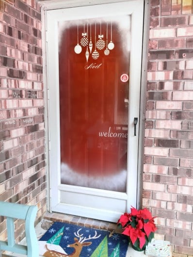 A DIY stenciled glass door using the Christmas Ornaments Stencil from Cutting Edge Stencils. http://www.cuttingedgestencils.com/christmas-ornamnets-accent-pillow-stencil-kit.html