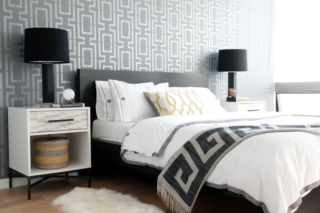 A DIY stenciled accent wall in a bedroom using the Connection Allover Stencil from Cutting Edge Stencils. http://www.cuttingedgestencils.com/wallpaper-stencil-connection.html