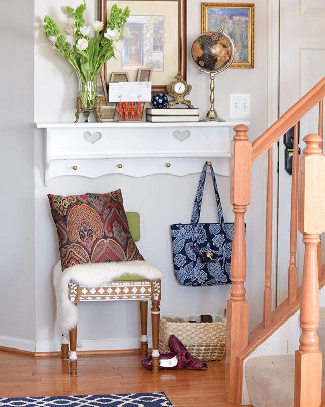 A DIY stenciled chair in an entryway using the Indian Inlay Stencil Kit from Cutting Edge Stencils. http://www.cuttingedgestencils.com/indian-inlay-stencil-furniture.html