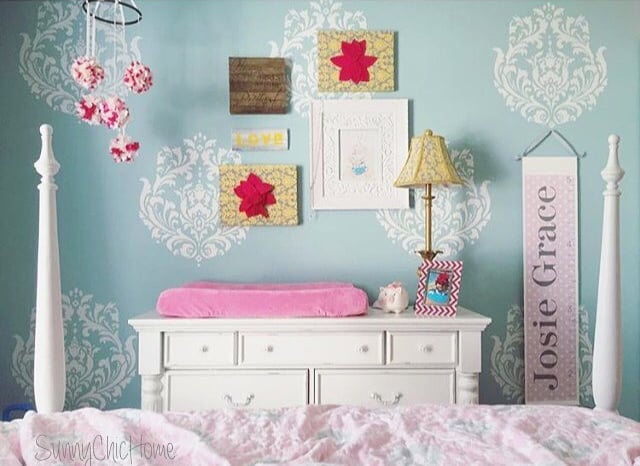 A DIY stenciled girls bedroom accent wall using the Brocade No. 1 Stencil from Cutting Edge Stencils. http://www.cuttingedgestencils.com/Brocade-stencil-damask.html