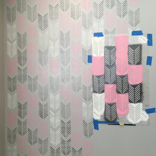 Stenciling a DIY accent wall in a playroom using the Drifting Arrows Allover Stencil from Cutting Edge Stencils. http://www.cuttingedgestencils.com/drifting-arrows-stencil-pattern-diy-decor.html 
