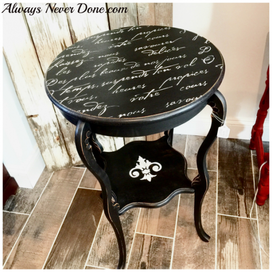 A stenciled DIY wooden table using the French Poem Craft Stencil from Cutting Edge Stencils. French Poem Craft Stencil from Cutting Edge Stencils. http://www.cuttingedgestencils.com/french-poem-diy-craft-stencil-design.html