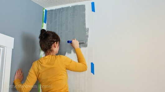 A DIY stenciled accent wall in a family room using the Birch Forest Allover Stencil from Cutting Edge Stencils. http://www.cuttingedgestencils.com/allover-stencil-birch-forest.html