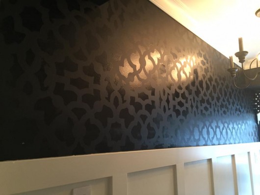 A DIY stenciled black and white pantry accent wall using the Zamira Allover Stencil from Cutting Edge Stencils. http://www.cuttingedgestencils.com/moroccan-stencil-designs.html