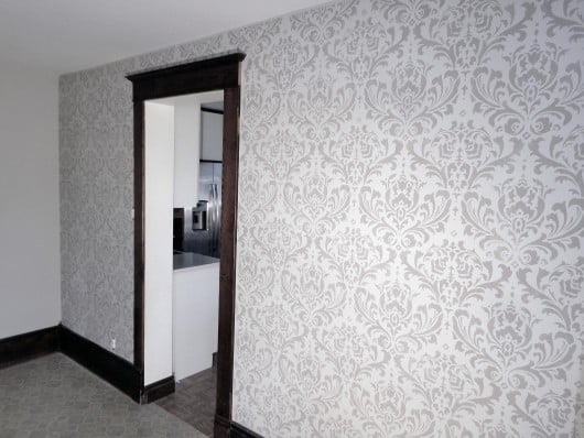 The Anna Damask Stencil from Cutting Edge Stencils painted on an accent wall in silver. http://www.cuttingedgestencils.com/damask-stencil.html