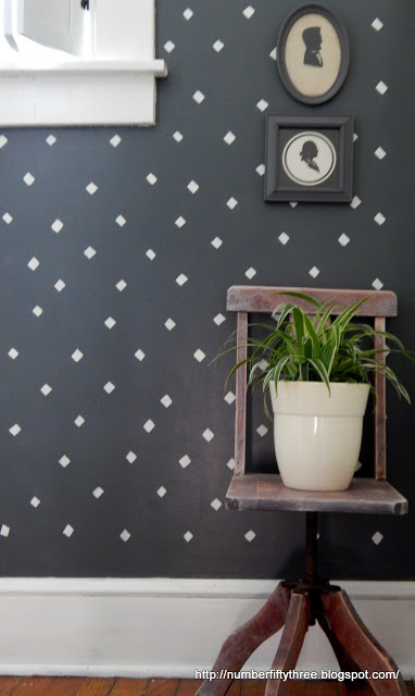 A DIY stenciled hallway accent wall in navy and white using the Little Diamonds Allover Stencil from Cutting Edge Stencils. http://www.cuttingedgestencils.com/little-diamonds-pattern-stencil-for-walls.html