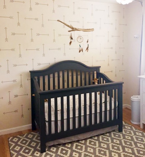A DIY stenciled nursery accent wall using the Tribal Arrows Allover Stencil from Cutting Edge Stencils. http://www.cuttingedgestencils.com/tribal-arrow-pattern-stencils-wall-decor.html