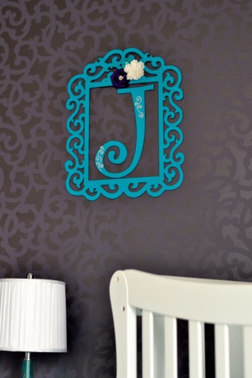 A DIY stenciled nursery accent wall using the Venetian Scroll Stencil from Cutting Edge Stencils. http://www.cuttingedgestencils.com/venetian-scroll-allover-stencil-pattern.html