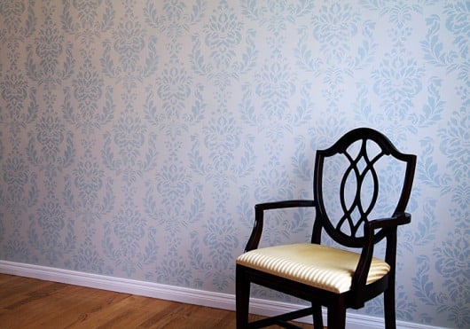 A DIY stenciled accent wall using the Verde Damask Stencil from Cutting Edge Stencils. http://www.cuttingedgestencils.com/damask-stencil-wallpaper.html