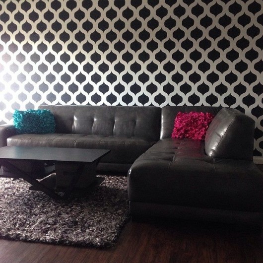 A DIY black and white stenciled accent wall using the Cascade Allover Stencil from Cutting Edge Stencils. http://www.cuttingedgestencils.com/cascade-allover-stencil-pattern.html