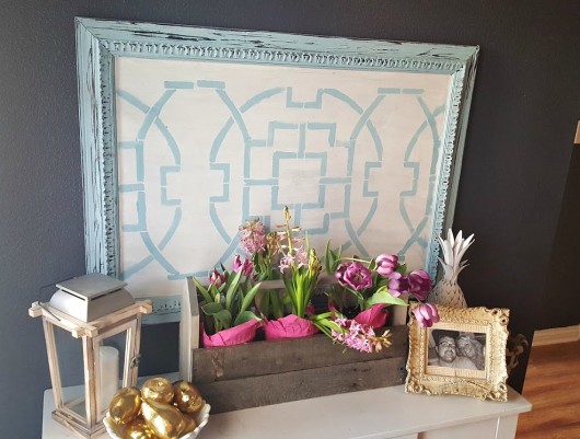 DIY stenciled wall art using an old canvas and the Tea House Trellis Stencil from Cutting Edge Stencils. http://www.cuttingedgestencils.com/tea-house-trellis-allover-stencil-pattern.html