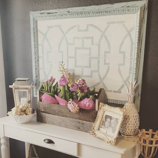 DIY stenciled wall art using an old canvas and the Tea House Trellis Stencil from Cutting Edge Stencils. http://www.cuttingedgestencils.com/tea-house-trellis-allover-stencil-pattern.html