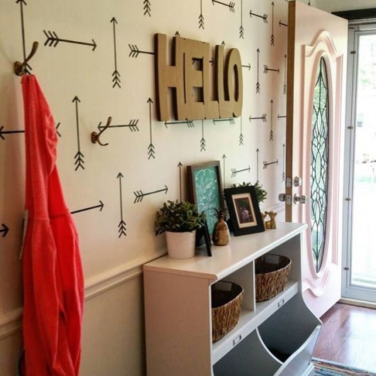 A DIY stenciled entryway accent wall using the Tribal Arrows Allover Stencil from Cutting Edge Stencils. http://www.cuttingedgestencils.com/tribal-arrow-pattern-stencils-wall-decor.html