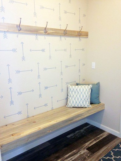 A DIY stenciled entryway accent wall using the Tribal Arrows Allover Stencil from Cutting Edge Stencils. http://www.cuttingedgestencils.com/tribal-arrow-pattern-stencils-wall-decor.html