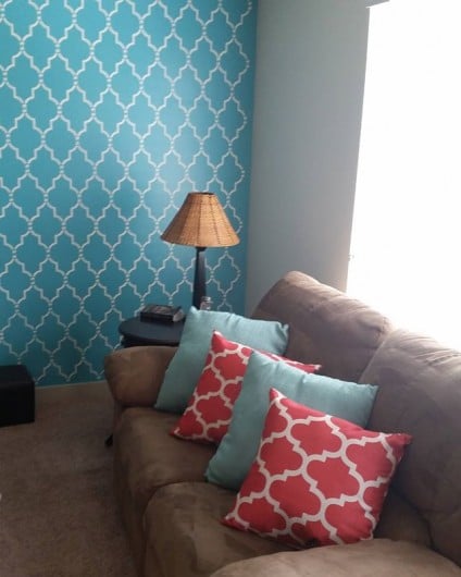 A DIY stenciled turquoise living room accent wall using the Marrakech Trellis Stencil from Cutting Edge Stencils. http://www.cuttingedgestencils.com/moroccan-stencil-marrakech.html