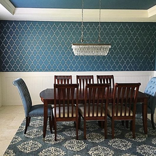 A DIY navy blue stenciled dining room using the Marrakech Trellis Stencil from Cutting Edge Stencils. http://www.cuttingedgestencils.com/moroccan-stencil-marrakech.html