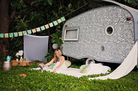 A DIY stenciled 1957 custom caravan used in a bohemian photoshoot featuring our Paisley Allover Stencil from Cutting Edge Stencils. http://www.cuttingedgestencils.com/paisley-allover-stencil.html