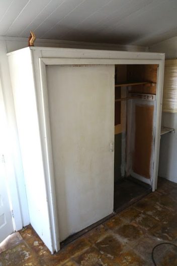 A mudroom before its makeover with stenciled coat rack. http://www.cuttingedgestencils.com/rabat-furniture-fabric-stencil.htmln