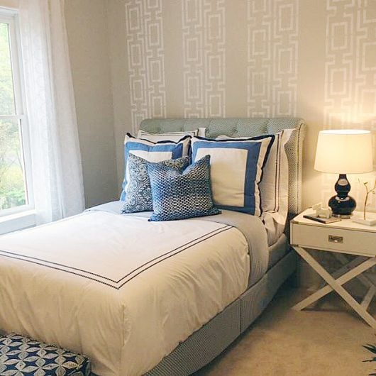 A DIY stenciled bedroom accent wall using a geometric stencil pattern, the Connection Allover Stencil, from Cutting Edge Stencils. http://www.cuttingedgestencils.com/wallpaper-stencil-connection.html