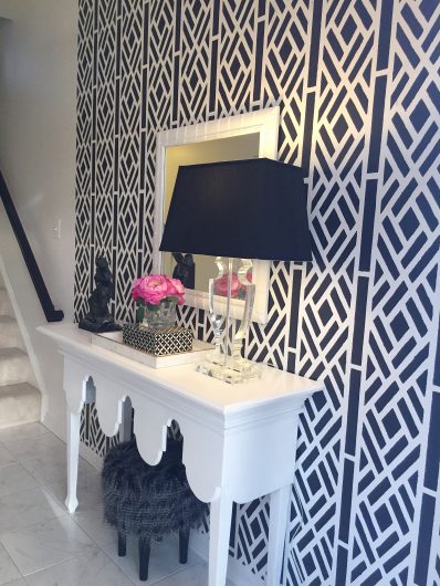 A DIY black and white stenciled entryway accent wall using the Lattice Allover Stencil Pattern from the designer series by Kathy Peterson, Cutting Edge Stencils. http://www.cuttingedgestencils.com/lattice-stencil-pattern-kathy-peterson.html