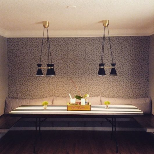 A DIY stenciled dining room accent wall using the Leopard Skin Allover Stencil from Cutting Edge Stencils. http://www.cuttingedgestencils.com/leopard-pattern-animal-skin-stencil.html