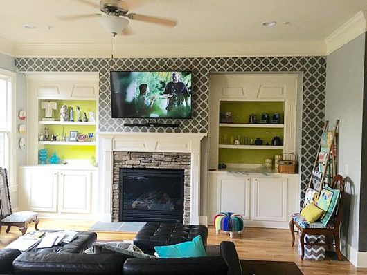 A DIY stenciled living room accent wall using the Moroccan Tiles Allover Stencil from Cutting Edge Stencils. http://www.cuttingedgestencils.com/moroccan-tiles-wall-pattern.html