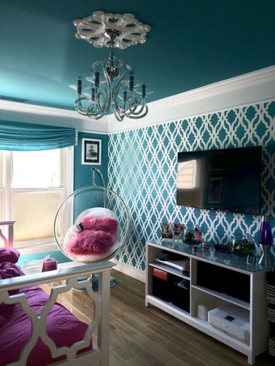 A DIY turquoise and white stenicled accent wall using the Tamara Trellis Allover Stencils from Cutting Edge Stencils. http://www.cuttingedgestencils.com/tamara-trellis-allover-wall-stencils.html