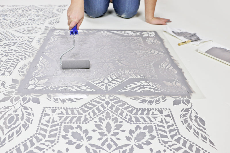 gray and white alhambra tile stencil on floors