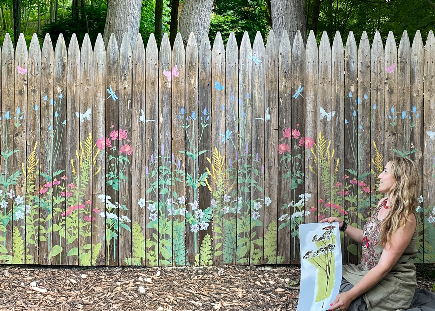 colorful floral garden fence mural with large flower stencils