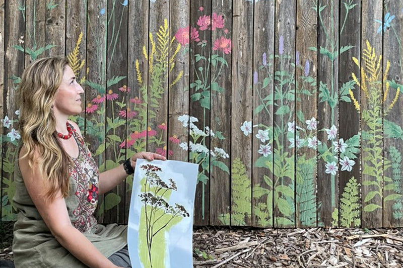 blooming garden stenciled fence mural