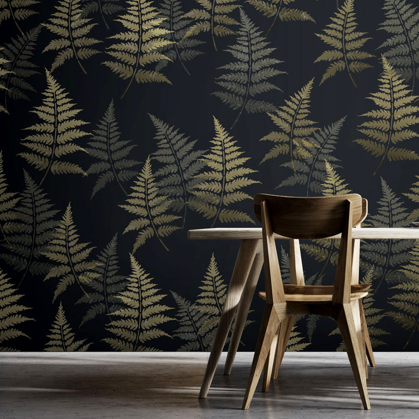 large fern leaves stenciled on a dark wall