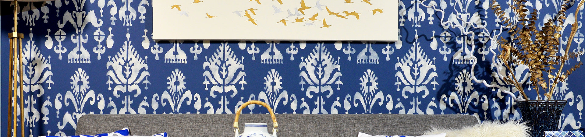 Blue wall stenciled in ikat pattern