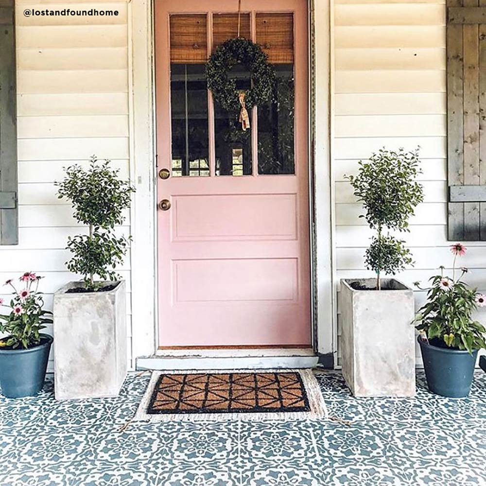 stenciled entryway pink door