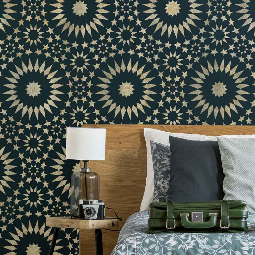 Ambrosia Moroccan Tile Stencil Wall Pattern  in Metallic Gold on a Dark Bedroom Wall