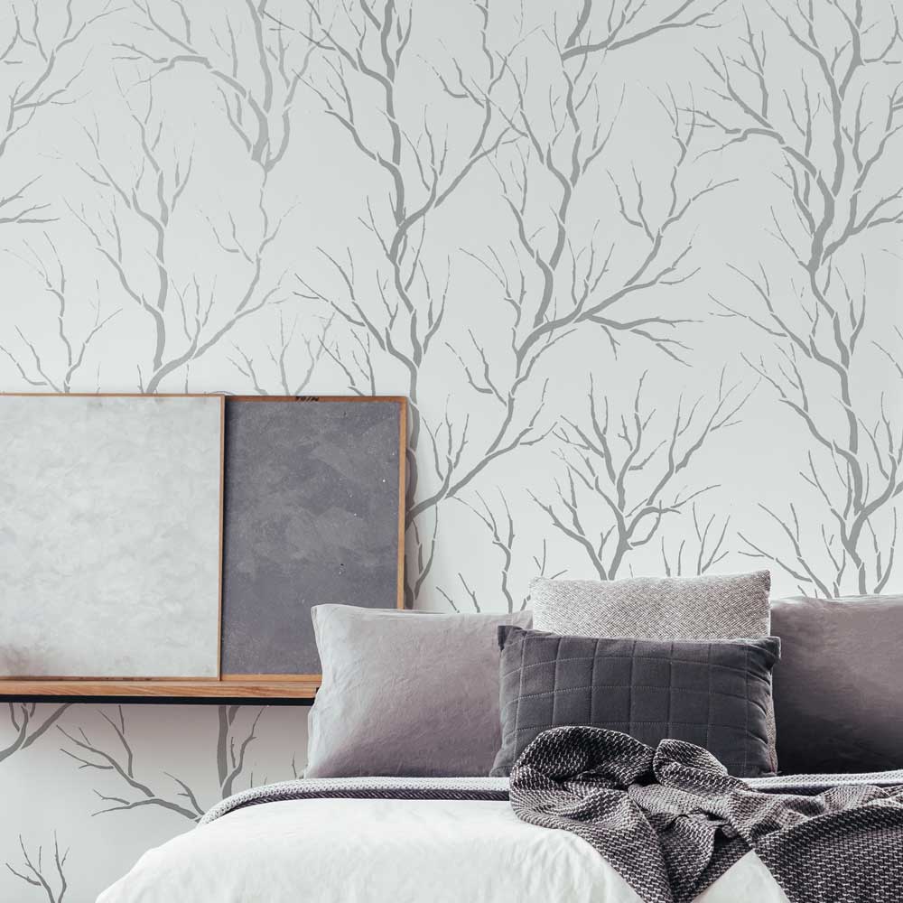 lemon branch wall stencil on gray wall in bedroom 