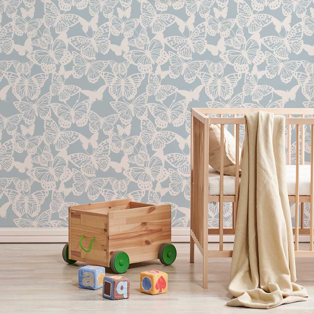 nursery butterfly design kids room wood furniture blue wall white butterfly butterfly magic allover wall stencil