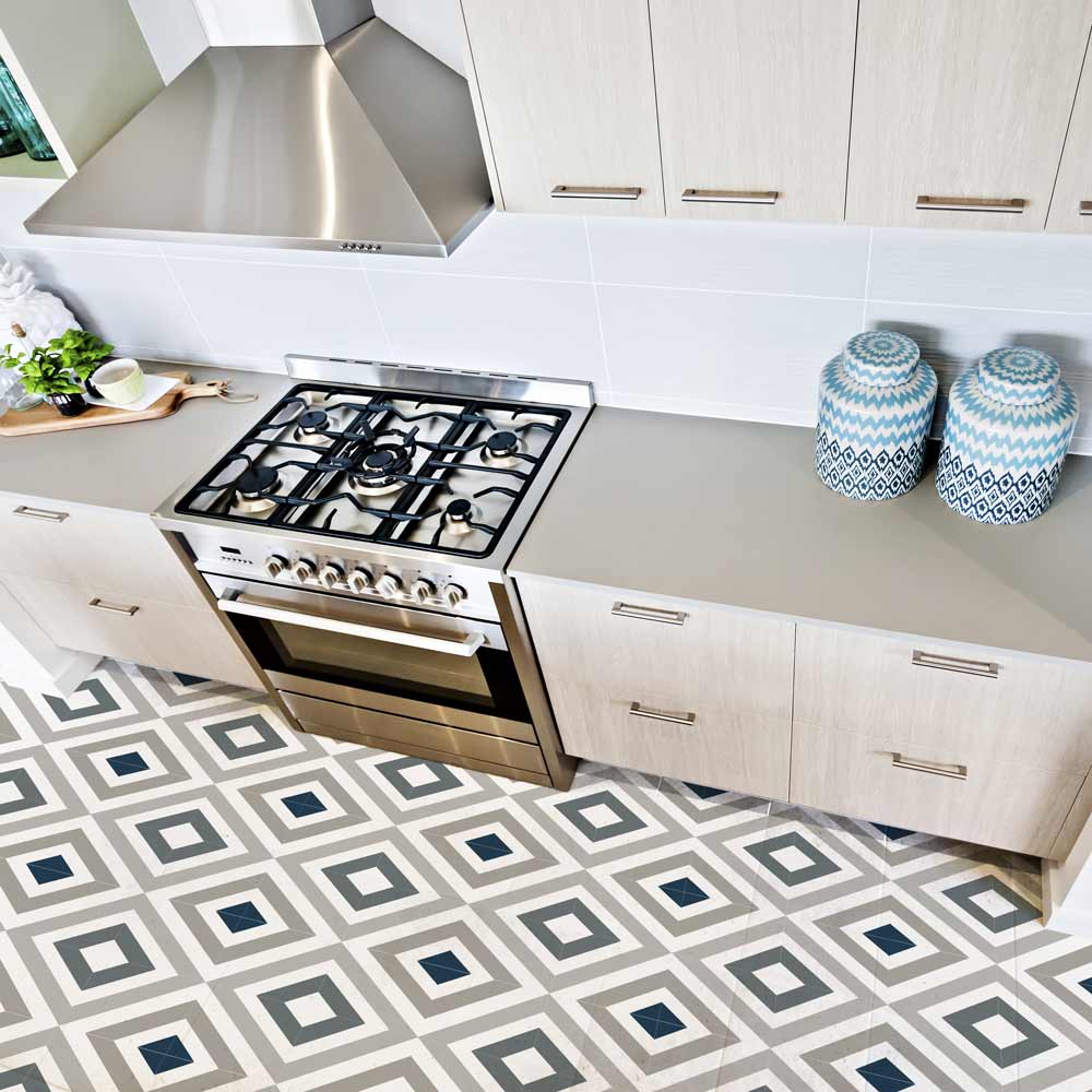 Echo Tile stenciled kitchen floor in navy and beige