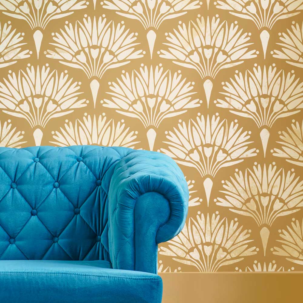 gold wall design fan flower living room blue couch