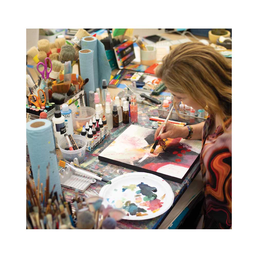 Janna Makaeva painting in her studio