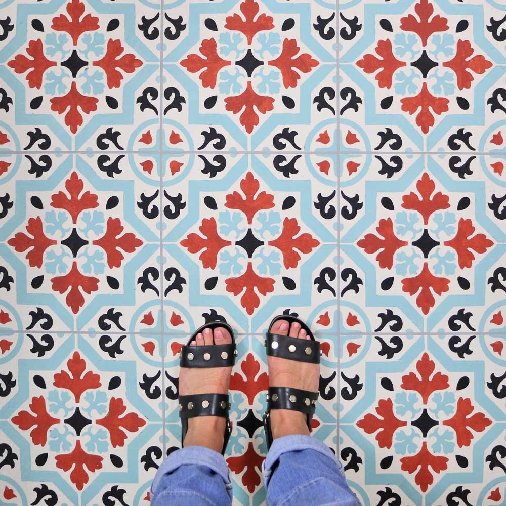 blue and red lyndhurst tile stenciled floor