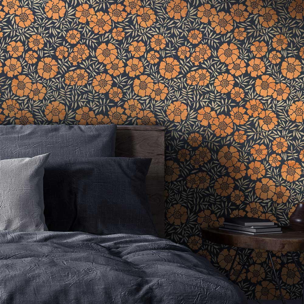 dark marigold floral stencil pattern on a bedroom wall