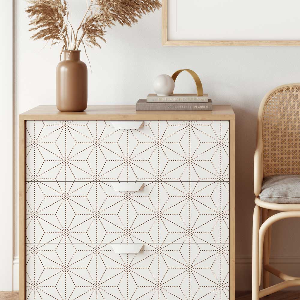 brown and white stenciled dresser front