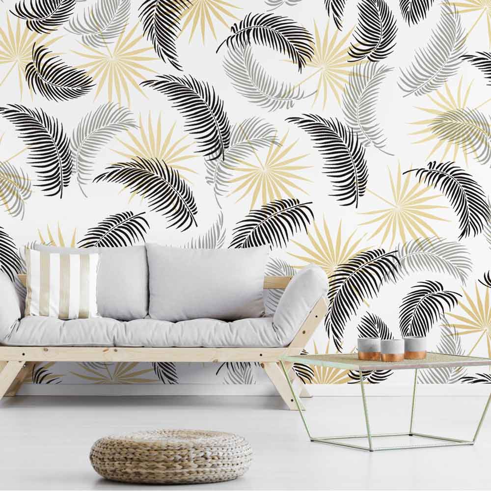 palm fronds tropical wall stencil pattern on living room accent wall