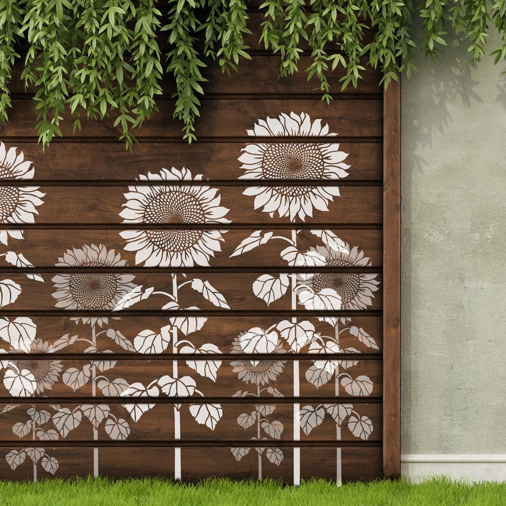 Sunflowers Stenciled on an outdoor fence